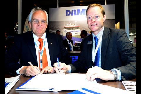 Nick Jeffrey of Solent Towage (left) and Arjen van Elk, sales manager for Damen Shipyards, sign the contract for two new tug/workboats